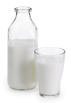a milk bottle and glass